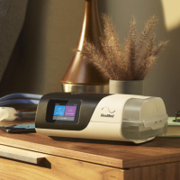 airsense 11 cpap machine on nightstand in the morning thumbnail